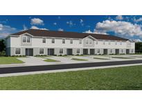 New two-story townhomes boast classic architectural details and private parking spaces for each unit at 317 Wharf Way, Winter Haven, FL 33881