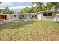 Charming single-story home with a well-maintained lawn and inviting curb appeal at 2332 S Crystal Lake Dr, Lakeland, FL 33801