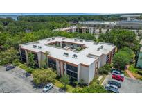 A peaceful condo complex with mature landscaping, convenient parking, and a serene atmosphere at 1130 N Lake Parker Ave # C321, Lakeland, FL 33805