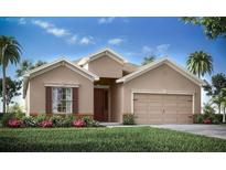 Charming single-story home featuring a 2-car garage, well-manicured lawn, and beautiful landscaping at 1833 Noble Dr, Davenport, FL 33837