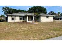 Charming single-story home with a well-lit entrance and a spacious front yard at 4038 Lehman Ln, Lakeland, FL 33813