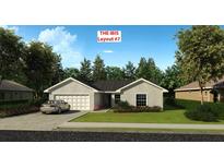 Charming single-story home featuring a well-maintained lawn and attached two car garage in a suburban neighborhood at 5909 Cormorant Ct, Lakeland, FL 33809