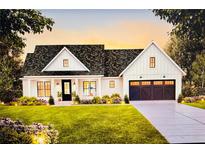 Charming new construction home with white siding, black accents, and a well-manicured lawn at 0 Walt Williams Rd, Lakeland, FL 33809