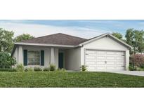 Charming single-story home with a well-manicured lawn, two-car garage, and inviting entrance at 1814 Daystar Dr, Haines City, FL 33844