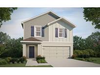 Charming two-story home with gray siding, blue shutters, and a two-car garage, surrounded by lush landscaping at 4482 Rapallo Ave, Winter Haven, FL 33884