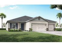 Charming single-story home with a two-car garage and well-manicured lawn at 6060 Barracuda Loop, Wimauma, FL 33598