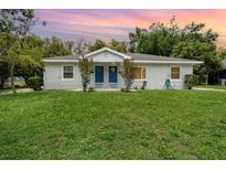 Charming duplex features a well-maintained lawn and inviting curb appeal at 1125 Josephine St, Lakeland, FL 33815