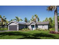 Charming single-story home with lush landscaping, solar panels, and a two-car garage at 161 Pecan Dr, Ocala, FL 34472
