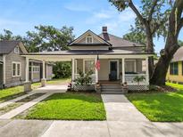 Charming single-Gathering home with a covered front porch, walkway and well maintained lawn at 918 South Blvd, Lakeland, FL 33803