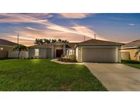 Charming single-Gathering home featuring a well-maintained lawn and two car garage at 3787 Sandhill Crane Dr, Lakeland, FL 33811