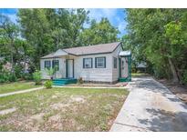 Charming single-story home featuring classic design with a well-maintained yard and long driveway at 1133 Bryn Mawr Ave, Lake Wales, FL 33853