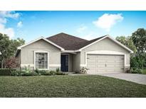 Charming single-story home with a well-manicured lawn and an attached two-car garage at 2231 Summerlake Ct, Auburndale, FL 33823