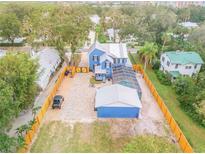 Expansive home featuring a pool, large yard, and multiple parking spaces, creating a private retreat at 532 Faulkner St, New Smyrna Beach, FL 32168