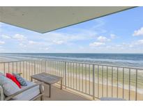 Ocean view balcony with patio furniture at 5203 S Atlantic Ave # 814B, New Smyrna Beach, FL 32169