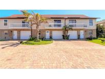 Charming multi-Gathering home featuring private balconies, garage parking and well-manicured landscaping at 731 Laurel Bay Cir, New Smyrna Beach, FL 32169