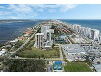 Aerial view of coastal community with oceanfront high-rise buildings at 1 Oceans West Blvd # 5A3, Daytona Beach, FL 32118