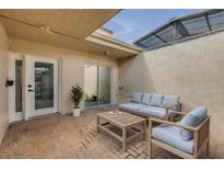 This charming brick patio features skylights and comfortable seating, perfect for relaxing or entertaining outdoors at 632 Sausalito Blvd, Casselberry, FL 32707