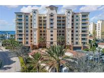 Elegant multi-story building with palm trees and ocean views at 263 Minorca Beach Way # 803, New Smyrna Beach, FL 32169