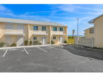 Two-story beach condo building with ocean view and parking at 4773 S Atlantic Ave # 10, Ponce Inlet, FL 32127