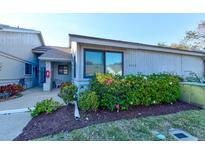 Charming condo featuring well-maintained landscaping and a peaceful, inviting exterior at 4322 Sea Mist Dr # 4322, New Smyrna Beach, FL 32169