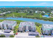 Beautiful aerial view of the condominiums near the waterway and intercoastal with amazing ocean views at 430 Bouchelle Dr # 202, New Smyrna Beach, FL 32169
