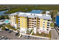 Stunning waterfront condo building with pool, parking, and bay views at 7 Riverwalk Dr # 205, New Smyrna Beach, FL 32169
