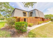 Charming two-story home with a fenced yard and inviting curb appeal at 3808 Saxon Dr, New Smyrna Beach, FL 32169