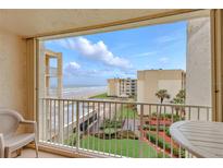 Lovely balcony view of the beach, pool, and manicured garden at this oceanfront condominium complex with a great view at 4175 S Atlantic Ave # 4050, New Smyrna Beach, FL 32169