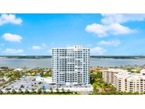 Stunning high-rise condo building featuring waterfront views and a beautiful, clear, sunny sky at 2 Oceans West Blvd # 702, Daytona Beach, FL 32118