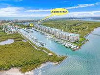 Beautiful waterfront condo with marina, lush landscaping, and stunning ocean views at 4620 Riverwalk Village Ct # 7403, Ponce Inlet, FL 32127