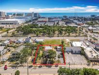 Wonderful home boasting lush landscaping and is near the beach and shopping at 20 N Halifax Ave, Daytona Beach, FL 32118