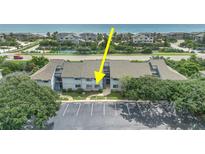 Coastal condo complex with ocean views, private parking, and lush landscaping for relaxed beach living at 4403 Sea Mist Dr # 109, New Smyrna Beach, FL 32169