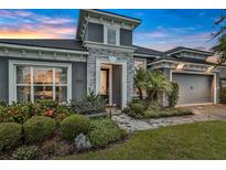 Charming single-Gathering home with landscaped front yard and inviting entrance at 6294 W Fallsgrove Ln, Port Orange, FL 32128
