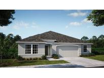 New single-story home with gray siding, gray roof, and a two-car garage at 605 N Boundary Ave, Deland, FL 32720