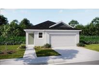 Charming single-story home featuring a two-car garage, landscaped yard, and inviting entryway at 2759 San Marco Way, Winter Haven, FL 33884