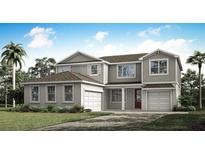 Charming two-story home with a two-car garage, landscaped yard, and a welcoming red front door at 2675 Ginseng Ivy St, Apopka, FL 32703