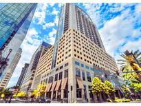 Modern high-rise building showcasing sleek architecture and prime location in the heart of the city at 155 S Court Ave # 1610, Orlando, FL 32801