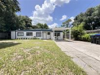 Cute freshly painted home with carport and a large yard at 902 San Domingo Rd, Orlando, FL 32808