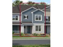 Charming two-story townhome featuring stylish blue siding and inviting front entrance with lush landscaping at 1459 Alston Bay Blvd, Apopka, FL 32703