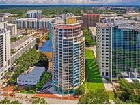 Aerial view of a modern highrise building in a city setting at 322 E Central Blvd # 1711, Orlando, FL 32801