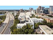 Orlando condominium complex near downtown skyline and major highway, offering urban convenience at 202 E South St # 6042, Orlando, FL 32801