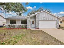 Updated one-story home with new paint and landscaping at 3629 Peaceful Pl, Orlando, FL 32810