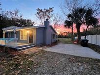 Charming one-story home with a covered porch and a spacious yard at 2906 4Th St, Orlando, FL 32820