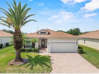 Charming single-story home featuring a well-maintained lawn and a spacious two-car garage at 4112 Aberdeen Ln, Lake Wales, FL 33859