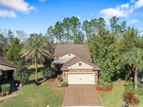 Attractive single-story home with stone accents and a two-car garage at 513 San Sebastian Ct, Davenport, FL 33837