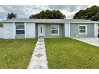 Updated single story home with walkway at 7736 Tern Dr, Orlando, FL 32822