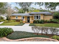 Beautiful 1-story home with a landscaped yard and driveway at 1218 Overlook Dr, Mount Dora, FL 32757