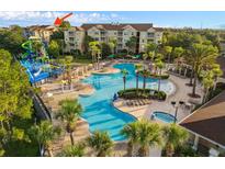 Resort-style pool, water park, and community building at 2821 Almaton Loop # 101, Kissimmee, FL 34747
