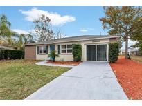 Charming ranch home with a spacious yard and updated facade at 3944 Janie Ct, Orlando, FL 32822