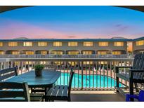 Enjoy sunset views from this balcony overlooking the pool at 111 N Atlantic Ave # 2090, New Smyrna Beach, FL 32169